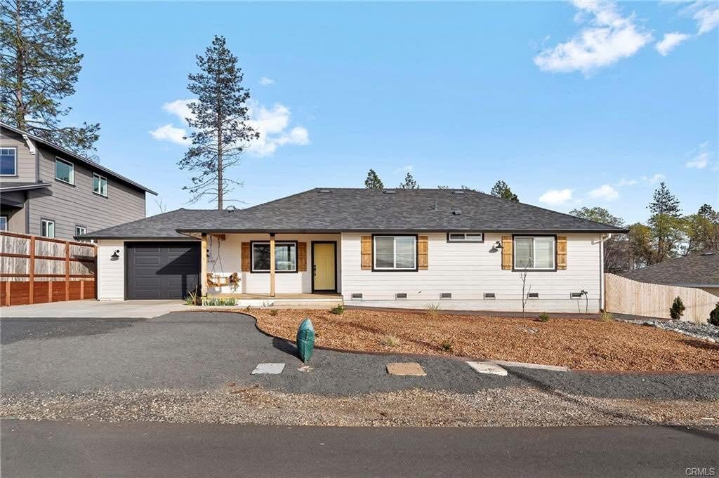 Ranch home front yard with clean decorative rock and refreshed curb appeal